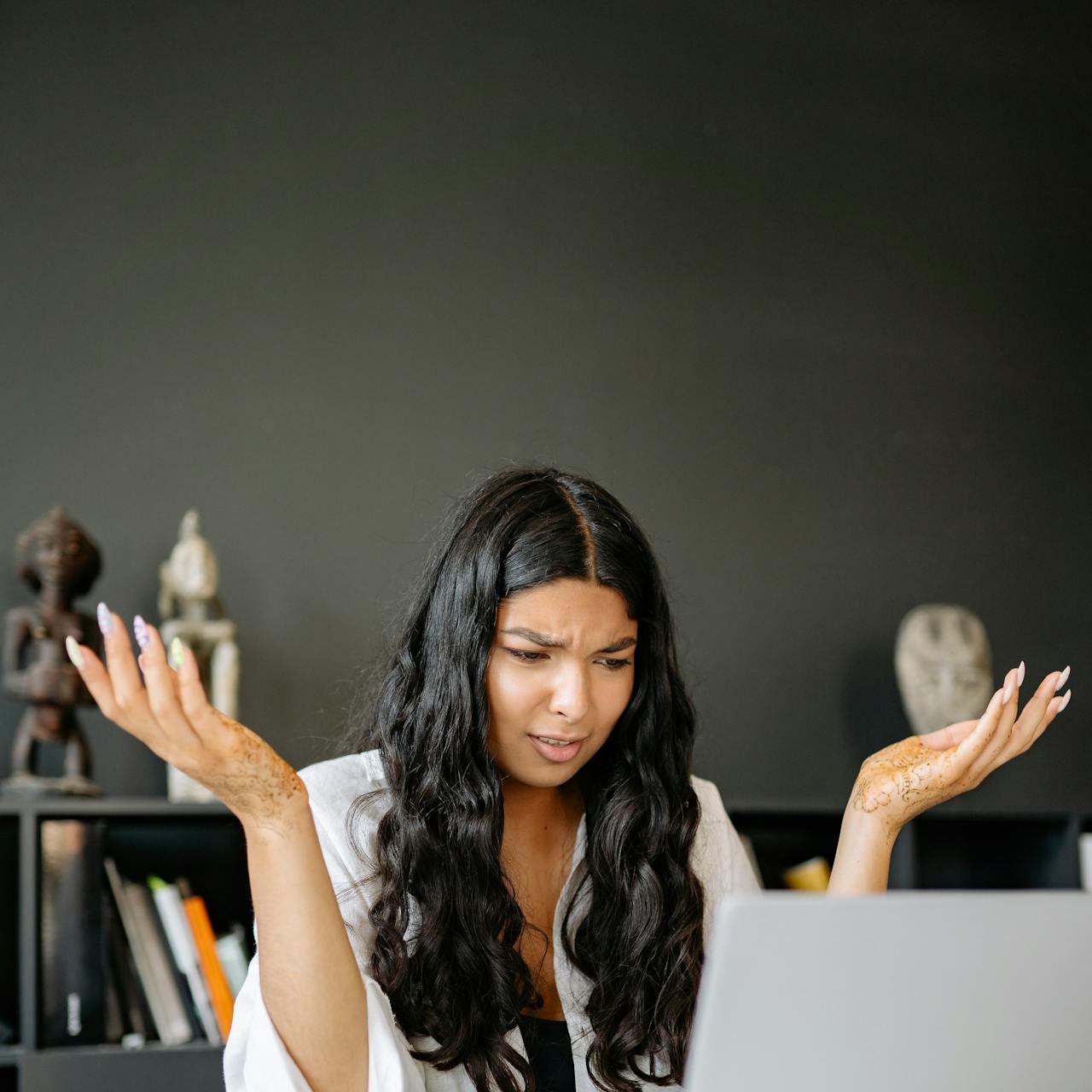 pexels-yankrukov-8837774 a woman looking confused looking at a computer